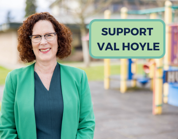 Smiling Val Hoyle with a button that says 'Support Val Hoyle'